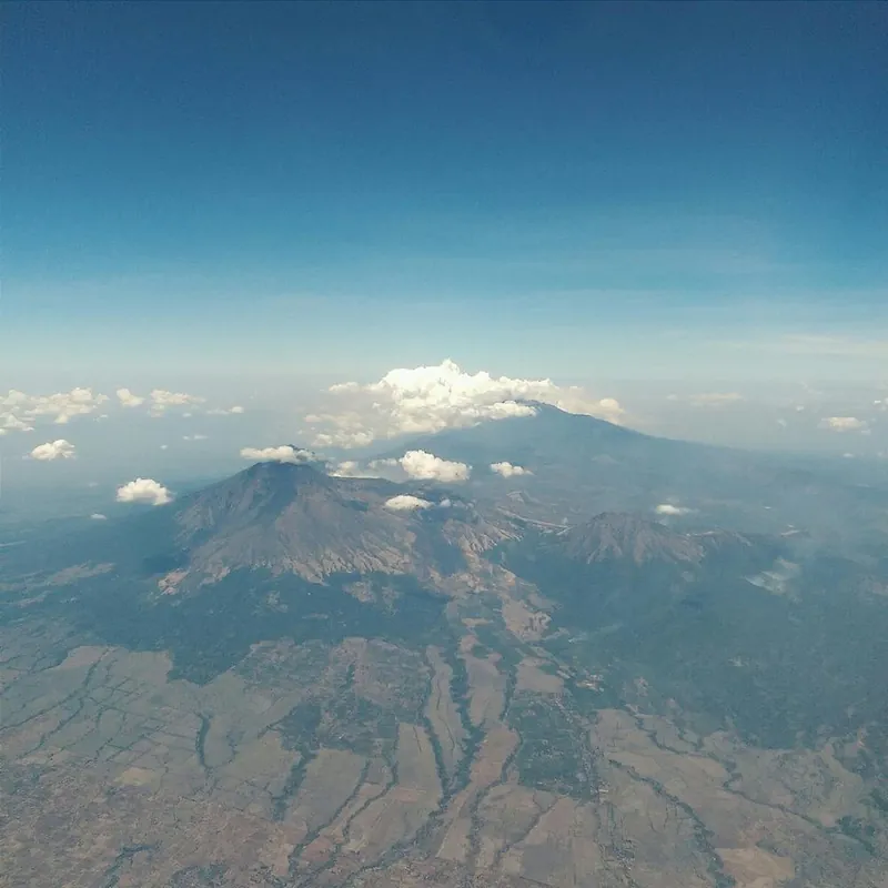 Airplane Window View Of Volanoes Square Deal